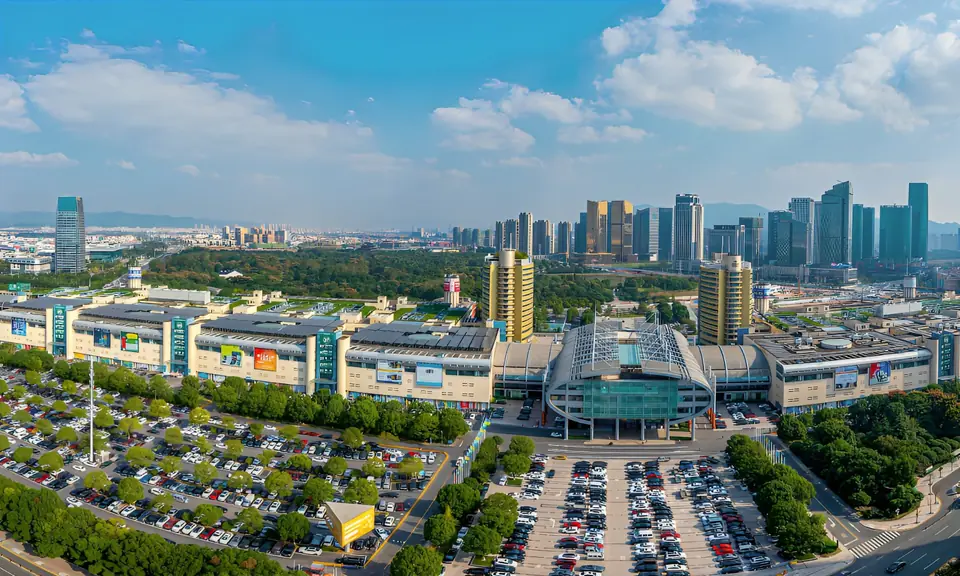 Aerial view of the Yiwu International Trade City, with the skyline behind it